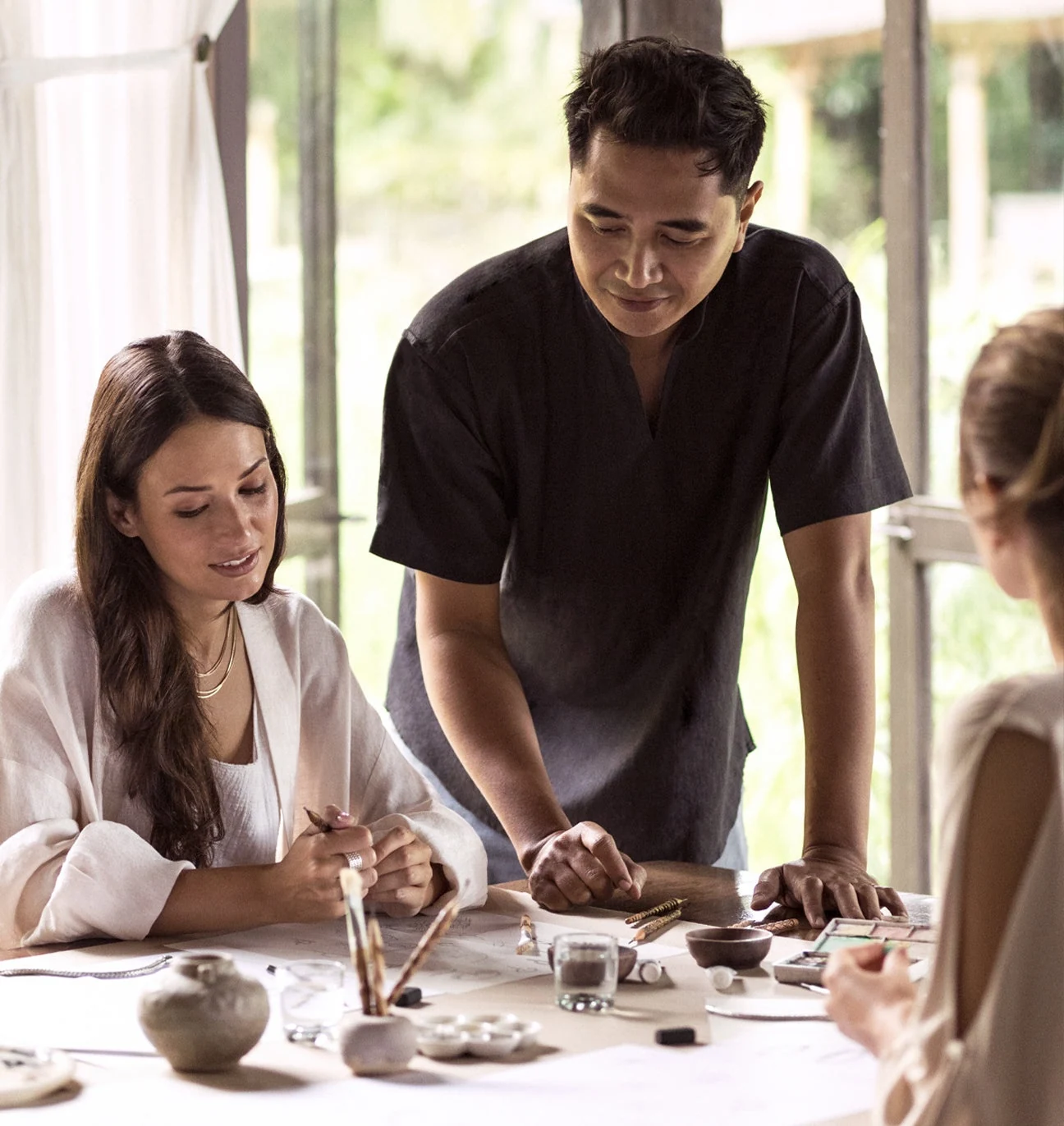 An artisan works on a jewellery design at John Hardy’s Kapal Bamboo workshop.