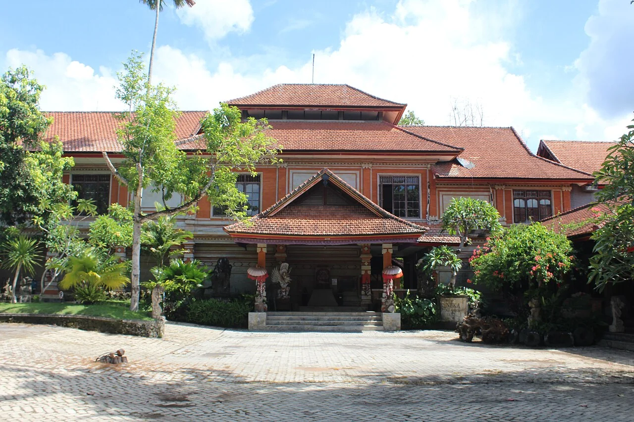 The red-roofed buildings and entrance courtyard of Neka Art Museum in Ubud, Bali.