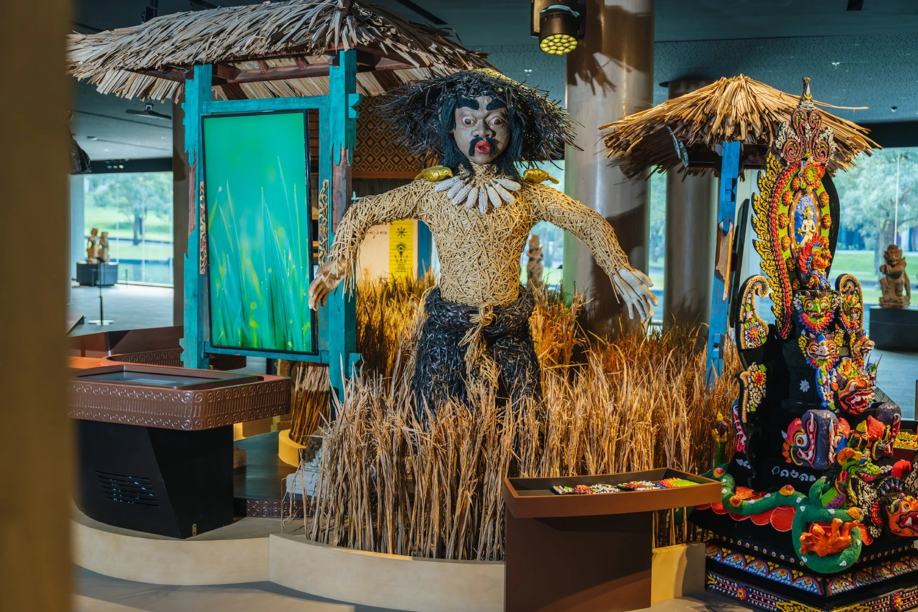 Traditional figures and rice-harvest displays in the Subak exhibition at SAKA Museum.