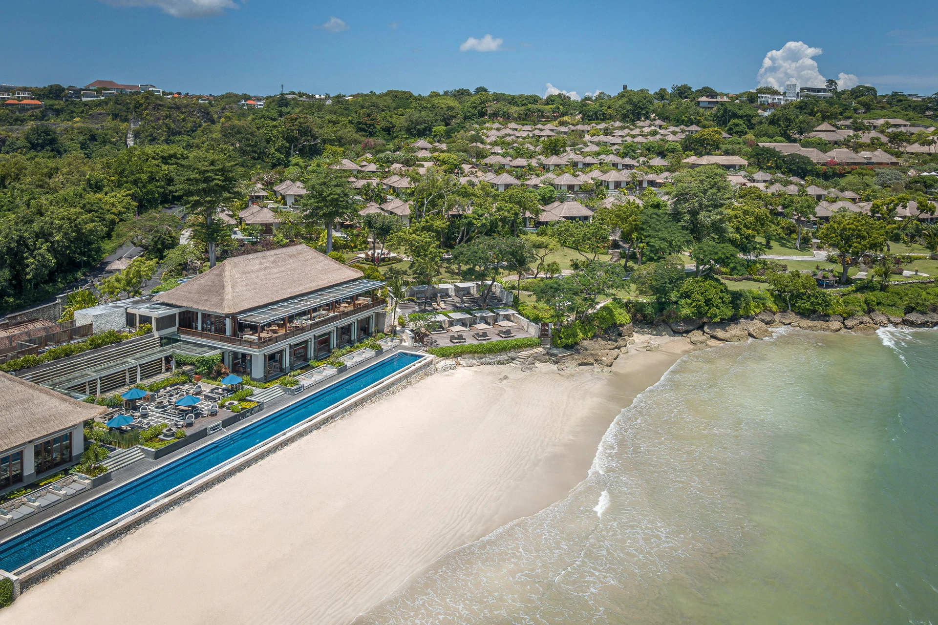 Aerial view of Sundara beachfront pool and restaurant at Jimbaran Bay.
