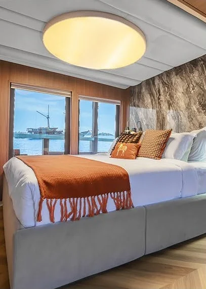 Kayra double cabin with warm wood finishes and large windows