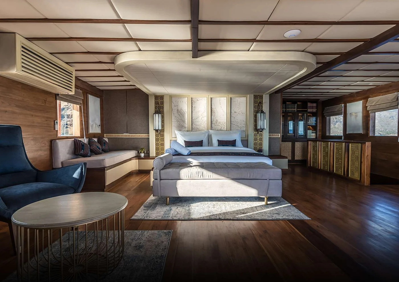 The Maj Oceanic spacious suite with timber finishes and pale upholstered seating