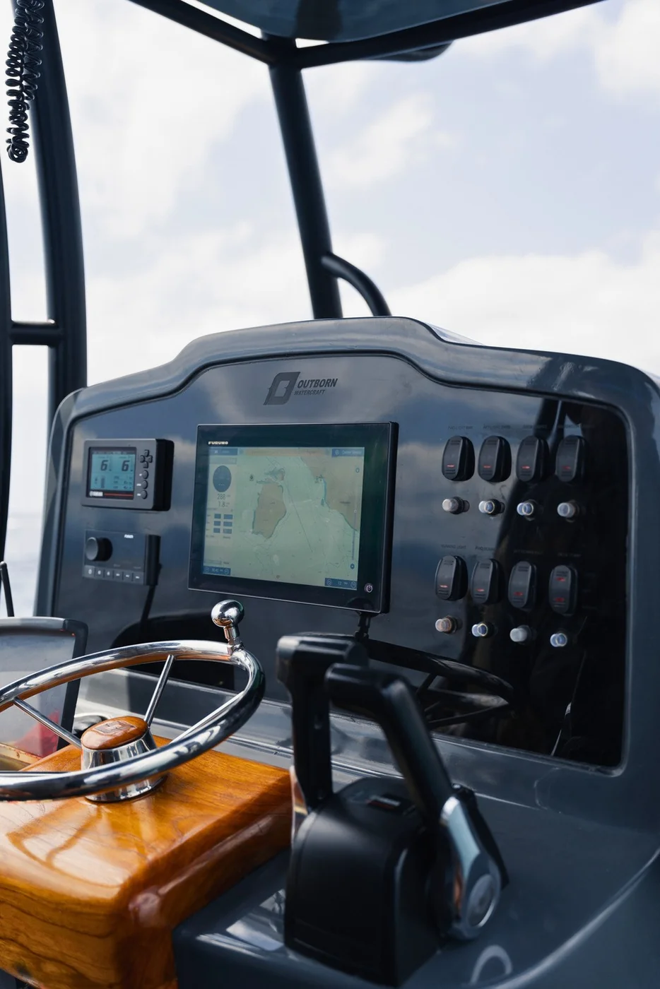 Typhoon helm with navigation displays and steering wheel
